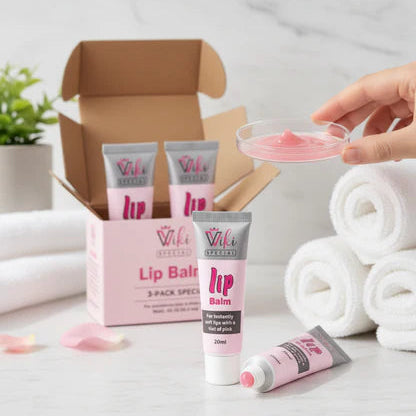 Lip balm product with packaging and a hand holding a small container of lip balm.